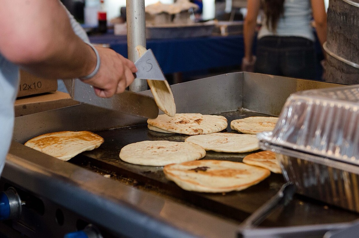 A gyros pita being wrapped